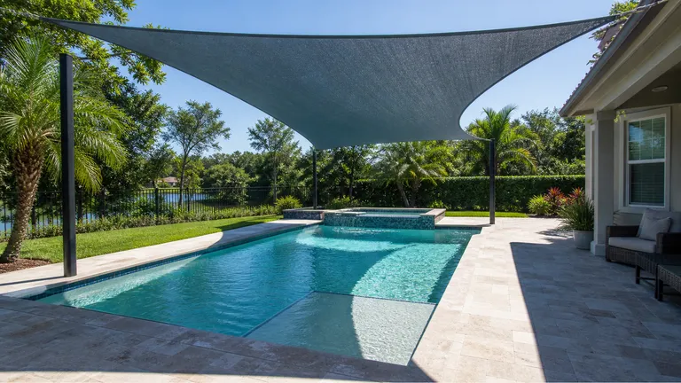 Pool with overhead shade showing shaded water and open deck space